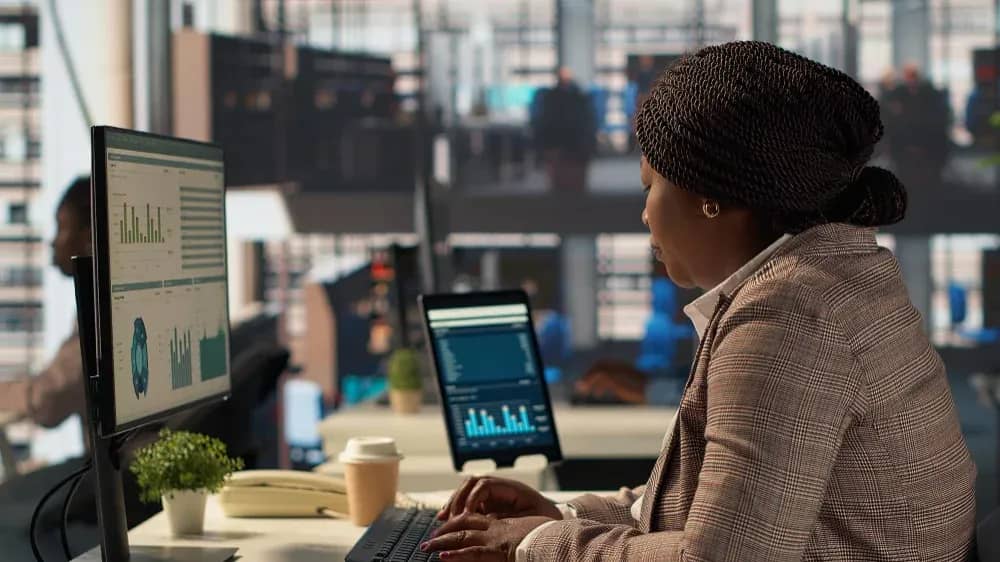 A woman in front of the computer