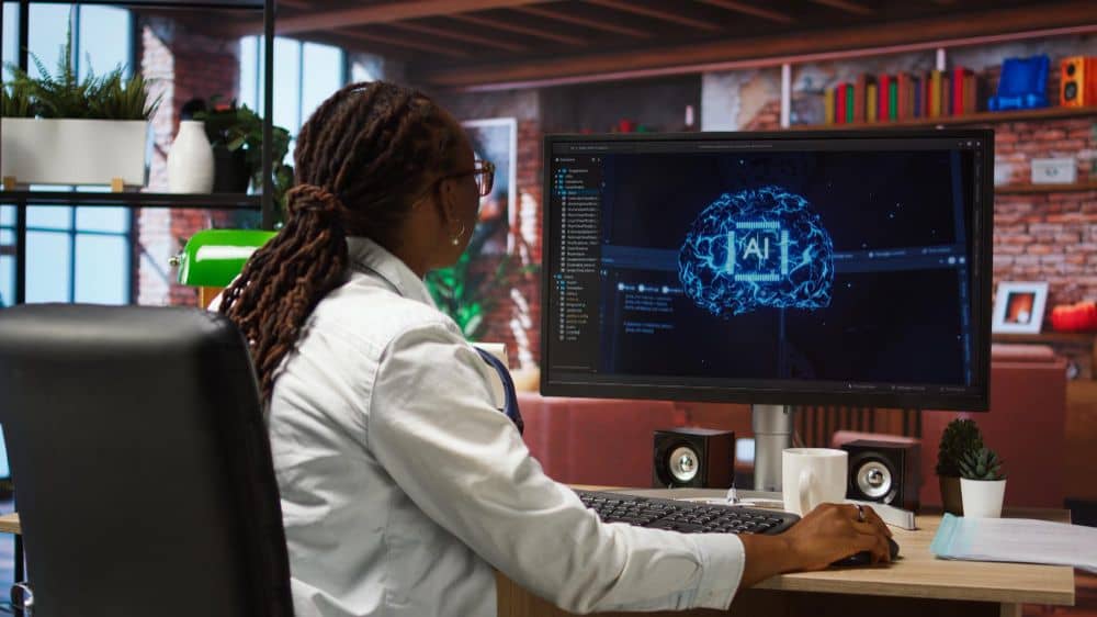 A woman in front of the computer